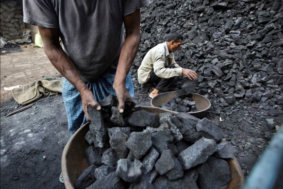 The world’s third-biggest emitter of greenhouse gases will raise the duty on coal to 200 rupees ($3.2) a ton, Finance Minister Arun Jaitley said in his budget speech for the year starting April 1. Photographer: Kuni Takahashi/Bloomberg